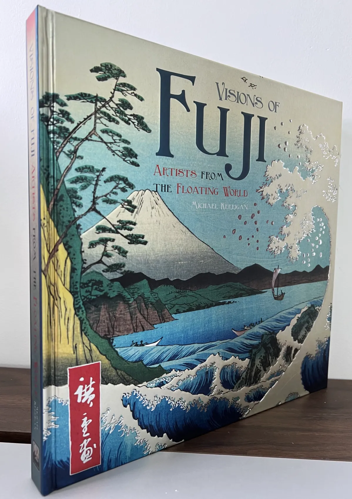 Hardcover book
Cover wrapped with silver foiled paper
Emboss on cover